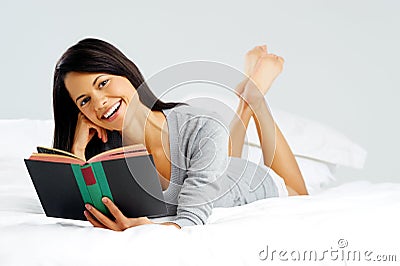 Happy book reading woman