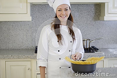 Happy chef about to cook pasta