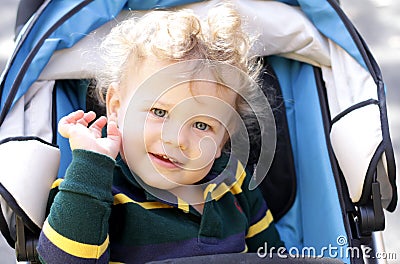 Happy Child in Stroller