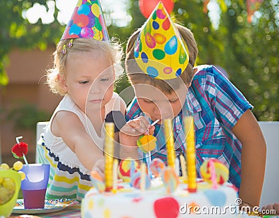 Happy children having fun at birthday party