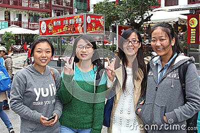 Happy students in West Street,Yangshuo,China