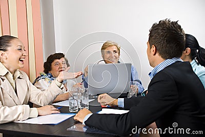 Happy conversation at business meeting