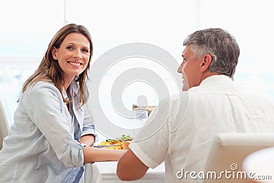 Happy couple having dinner