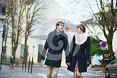 Happy couple having a walk in Paris