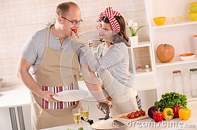 Happy couple in the kitchen