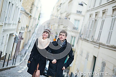 Couple in Paris on a spring or winter day