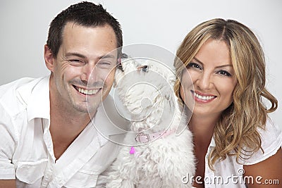 Happy couple with pet dog