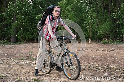 Happy cyclist on the coast