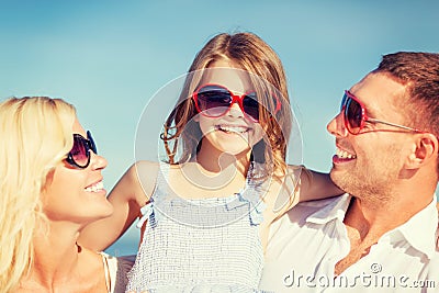 Happy family with blue sky