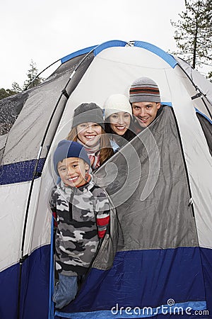 Happy Family Camping In Winter