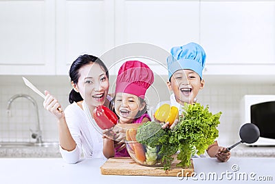 Happy family cook in kitchen
