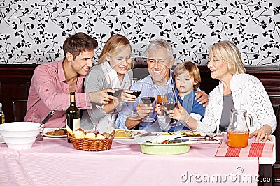 Happy family at dinner table