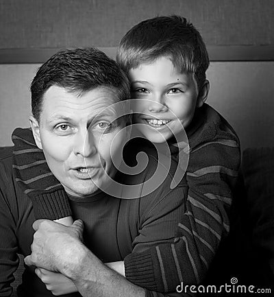 Happy family. Father and son at home.