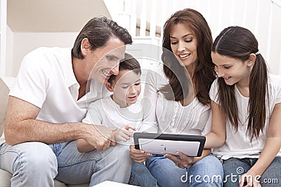 Happy Family Having Fun Using Tablet Computer