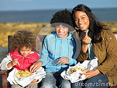 Happy family having picnic