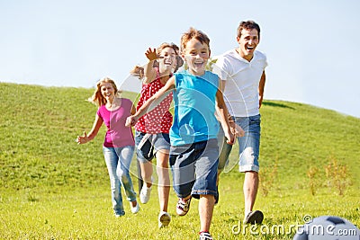 Happy family running