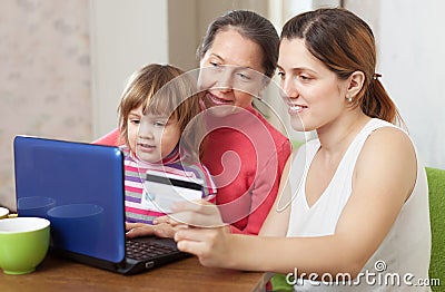 Happy family shopping in internet from home