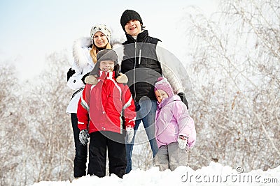 Happy family in winter park