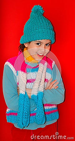 Happy girl in colorful wool knits