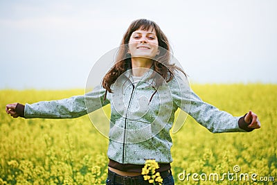 Happy girl in flower field