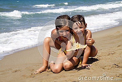 Happy girls on the beach