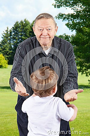 Happy grandpa with open arms