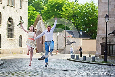 Happy just married couple jumping