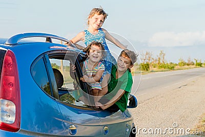 Happy kids in car, family trip, summer vacation travel