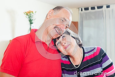 Happy loving elderly couple