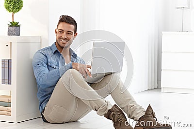 Happy man with laptop