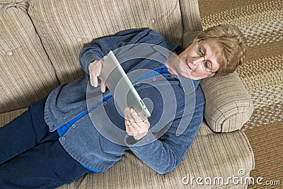 Mature Senior Elderly Woman Use Ipad Computer