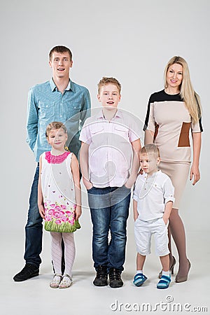 Happy modern family of five people