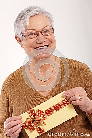 Happy old lady with present