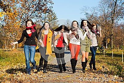 Happy pretty girls in the park