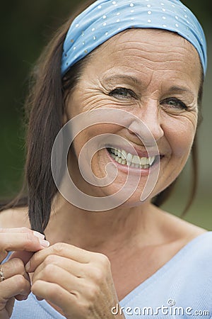 Happy relaxed attractive senior woman