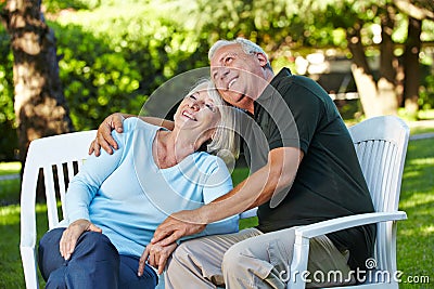 Happy senior couple in a garden