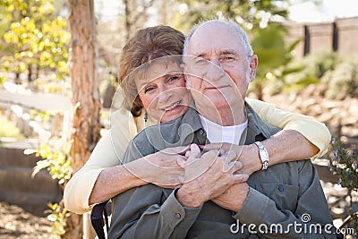 Happy Senior Couple Relaxing in The Park