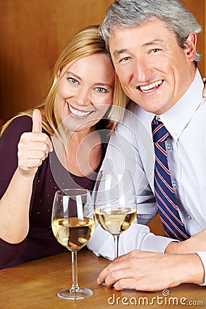Happy senior couple in restaurant