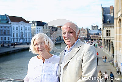 Happy senior couple sightseeing in Europe