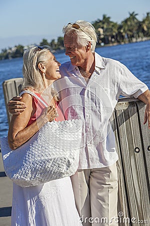 Happy Senior Couple Walking Tropical Sea or River