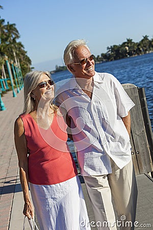 Happy Senior Couple Walking Tropical Sea or River