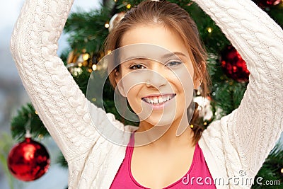 Happy and smiling woman with christmas tree