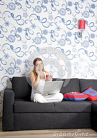 Happy smiling woman with laptop working