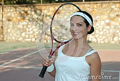 Happy tennis player woman