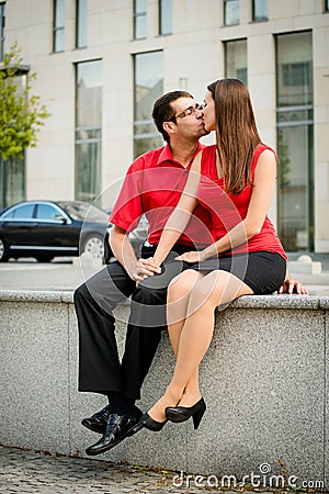 Happy together - young couple kissing