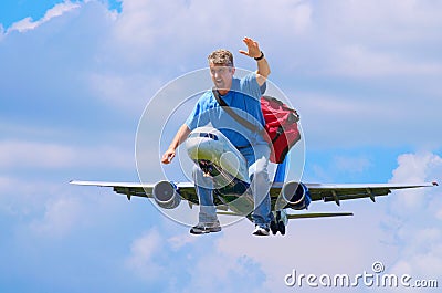 Happy traveler man riding airlplane