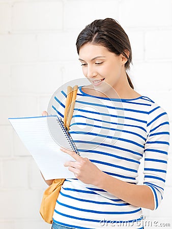 Happy woman with big notepad