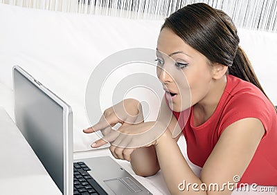 Happy woman with a computer