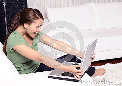 Happy woman with a computer