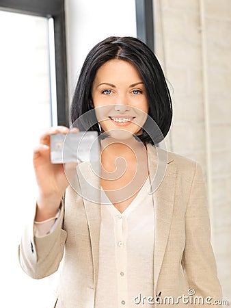 Happy woman with credit card